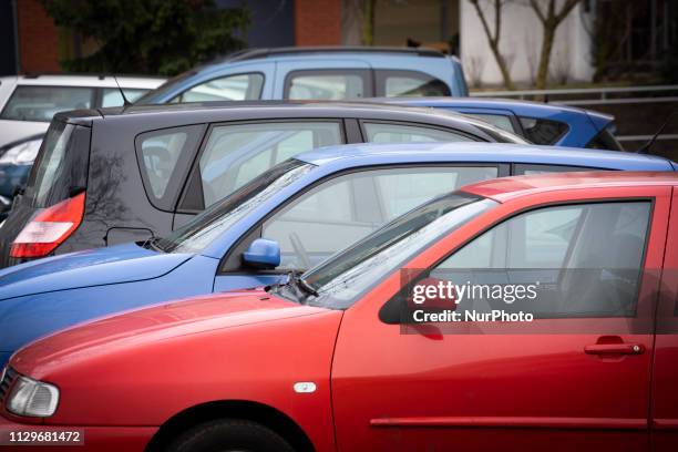 Cars areseen parked in front of a shopping mall in Bydgoszcz, Poland on March 10, 2019.