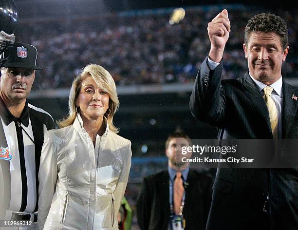 Norma Hunt, widow of the late Kansas City Chiefs' owner Lamar Hunt, iwatches as Dan Marino performs the coin toss at Super Bowl XLI in Miami,...