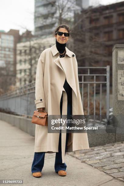 Leandra Medine is seen on the street during New York Fashion Week AW19 wearing Staud on February 13, 2019 in New York City.