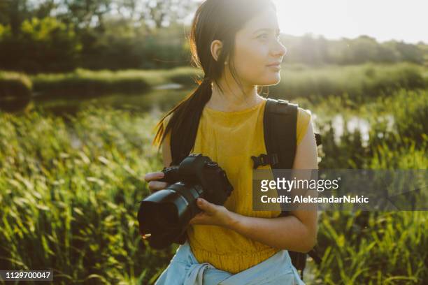 photographer taking pictures in the nature - photographer taking pictures nature stock pictures, royalty-free photos & images