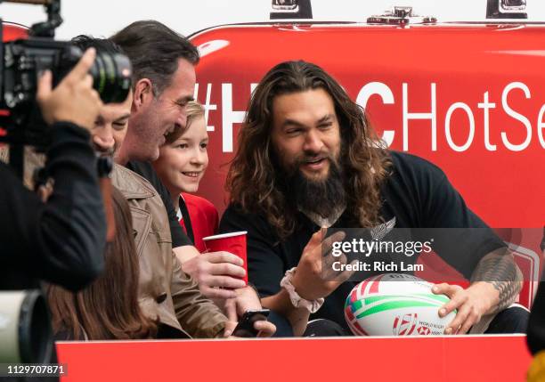 Jason Momoa and Patrick Warburton pose for photos on Day 2 of the HSBC Canada Sevens at BC Place on March 10, 2019 in Vancouver, Canada.