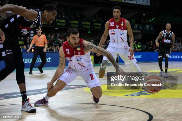 Mike James, #2 of AX Armani Exchange Olimpia Milano chases the ball during the Postemobile Final Eight 2019 second quarter final match between AX...