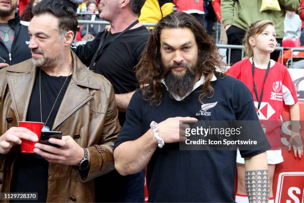 Actor and star of the movie Aquaman Jason Mamoa poses for the camera and points at his New Zealand All Blacks t-shirt during day 2 of the 2019 Canada...