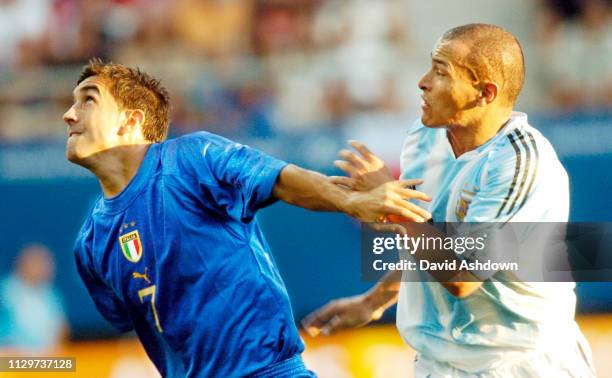 OLYMPIC GAMES IN ATHENS 2004. 24/8/2004 FOOTBALL ARG V ITALY GIAMPIERO PINZI AND CLEMENTE RODRIGUEZ.
