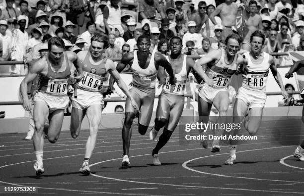 Summer Olympics in Seoul Men's 4 ?ù 100 metres relay Final. Mike McFarlane hands over to Linford Christie who is running the last leg for Silver the...