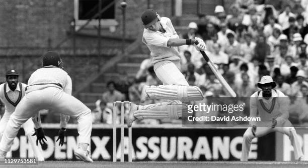 David Gower jumps away from a ball bowled by Malcolm Marshall during the 5th test England v West Indies at the Oval, London. 11th August 1984.
