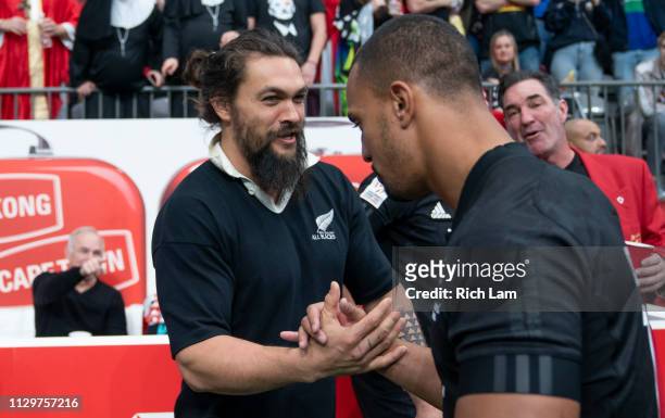 Jason Momoa meets with Jona Nareki of New Zealand after the team's final match on Day 2 of the HSBC Canada Sevens at BC Place on March 10, 2019 in...