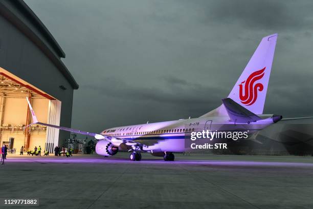 This photo taken on December 15, 2018 shows a Boeing 737 MAX 8 airplane delivered to Air China during a ceremony at Boeing Zhoushan 737 Completion...