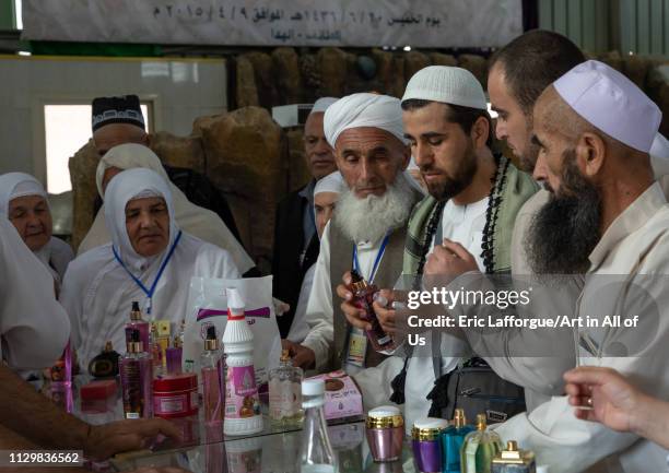 Group of indonesian pilgrims back from hajj buying souvenirs in a rose factory, Mecca province, Taïf, Saudi Arabia on December 13, 2018 in Taïf,...