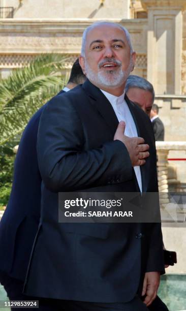 Iran's Foreign Minister Mohammad Javad Zarif arrives at the Presidential palace in Baghdad on March 11, 2019. - Iran's President Hassan Rouhani...