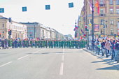 Blurred background image of a cordon of the soldiers during the procession of citizens for the background.