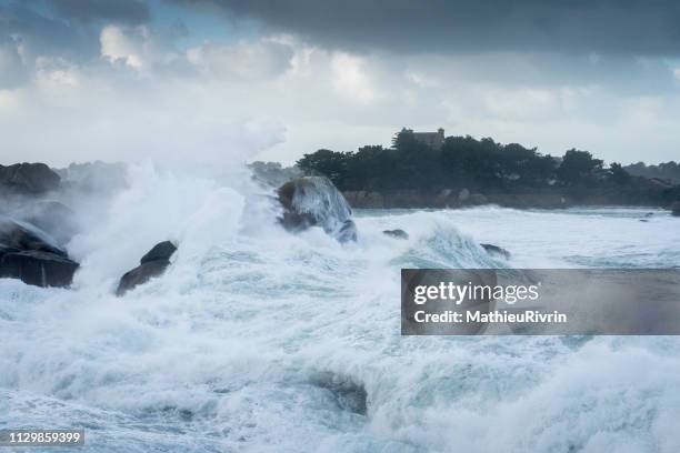 storm in ploumanach and the "cote de granite rose" - impression forte stock pictures, royalty-free photos & images