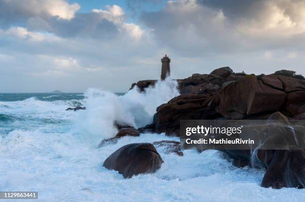 storm in ploumanach and the "cote de granite rose" - lumière vive stock pictures, royalty-free photos & images