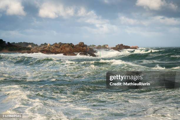 storm in ploumanach and the "cote de granite rose" - impression forte stock pictures, royalty-free photos & images