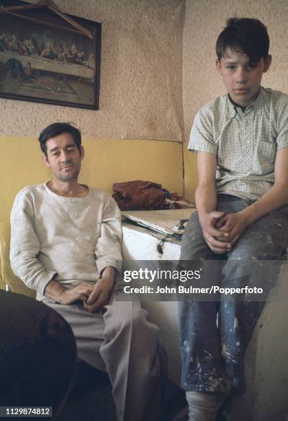 Man and a boy at their family home, Pike County, Kentucky, US, 1967.