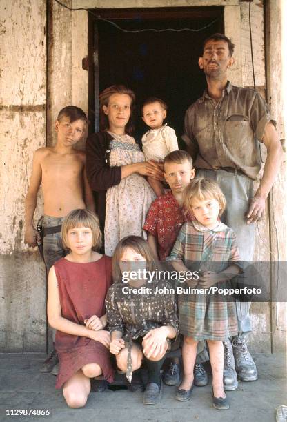 Miner with his wife and six children, Pike County, Kentucky, US, 1967.