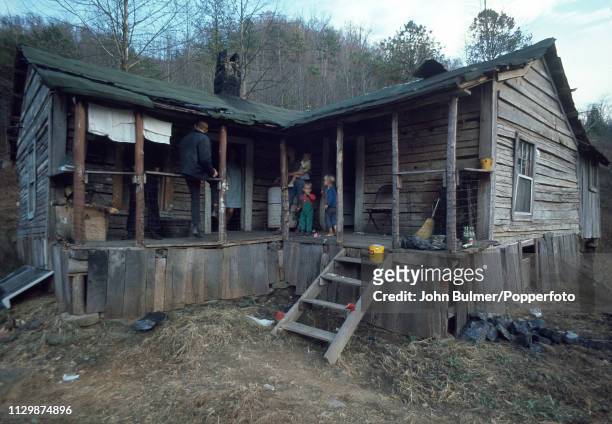 Ramshackle family home in Pikeville, Pike County, Kentucky, US, 1967.