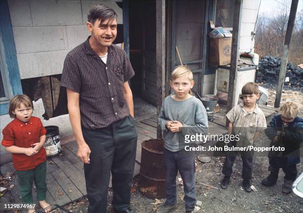 Man with his four children, Pike County, Kentucky, US, 1967.