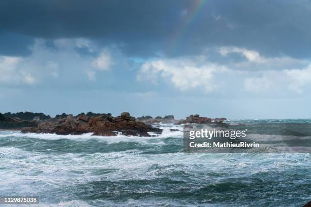 storm in ploumanach and the "cote de granite rose" - lumière vive stock pictures, royalty-free photos & images