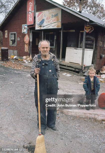 Man and a boy outside a shop, Pike County, Kentucky, US, 1967.