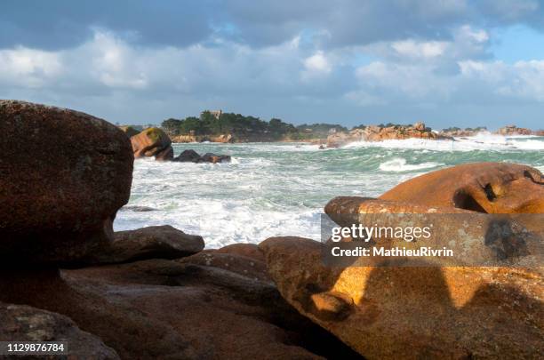 storm in ploumanach and the "cote de granite rose" - impression forte stock pictures, royalty-free photos & images