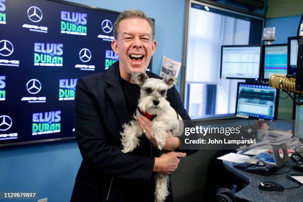 Elvis Duran and his dog Max are seen in the studio at the "The Elvis Duran Z100 Morning Show" at Z100 Studio on February 15, 2019 in New York City.