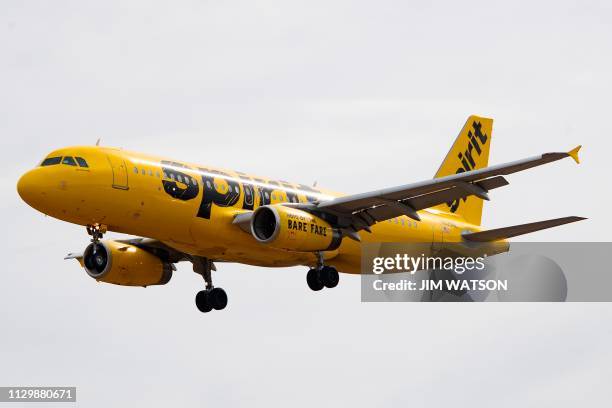An Airbus 320 operated by Spirit Airlines approaches for landing at Baltimore Washington International Airport near Baltimore, Maryland on March 11,...