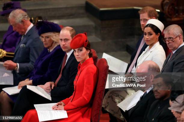 Catherine, Duchess of Cambridge, , sits with Prince William, Camilla, the Duchess of Cornwall and Prince Charles, front row, Prince Andrew,...