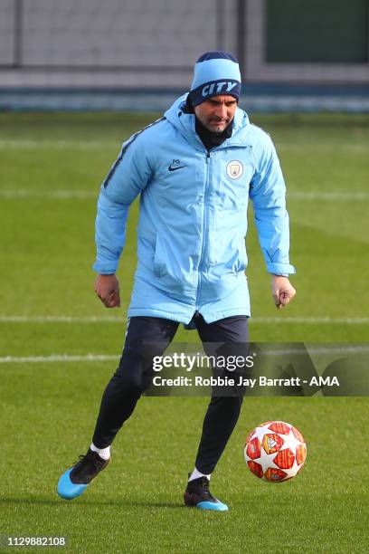 Pep Guardiola the head coach / manager of Manchester City during the Manchester City Press Conference & Training Session ahead of their UEFA...