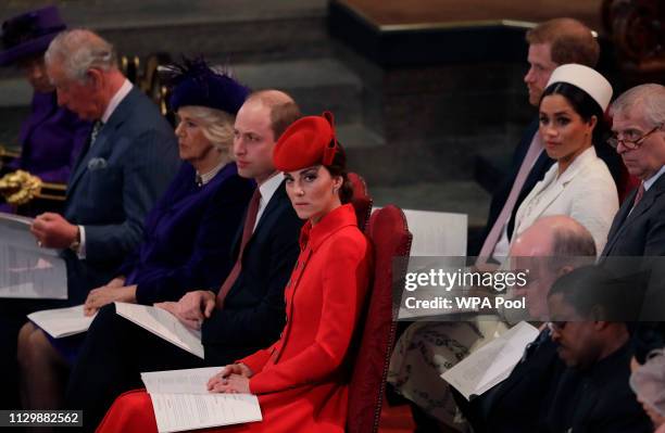 Catherine, Duchess of Cambridge, foreground centre, sits with Prince William, Camilla, the Duchess of Cornwall and Prince Charles, front row, Prince...