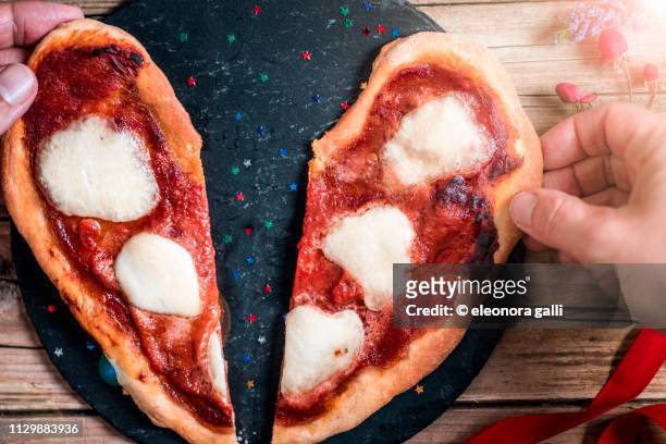 heart pizza - heart shape pizza stock pictures, royalty-free photos & images
