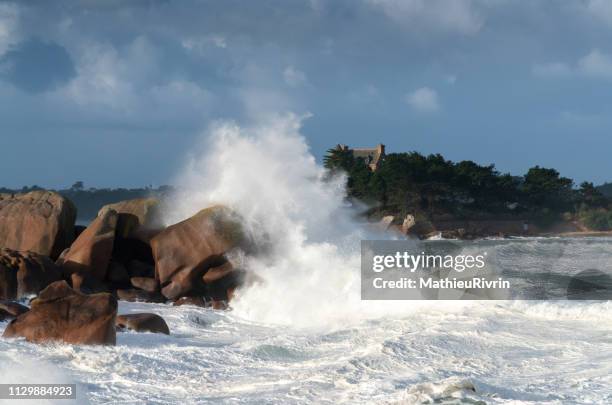 storm in ploumanach and the "cote de granite rose" - impression forte stock pictures, royalty-free photos & images