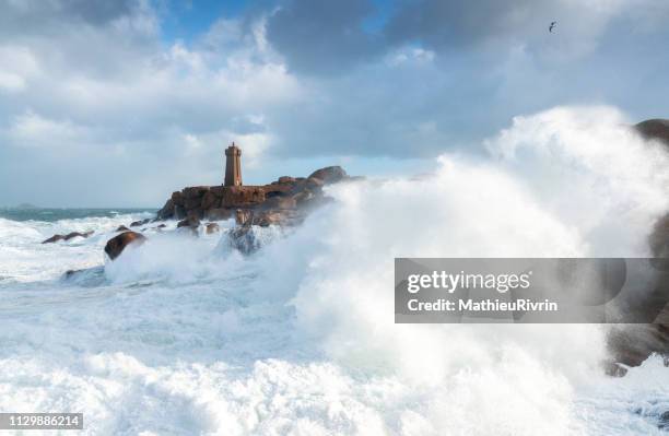 storm in ploumanach and the "cote de granite rose" - impression forte stock pictures, royalty-free photos & images