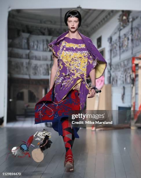 Model walks the runway at the Matty Bovan show during London Fashion Week February 2019 at the BFC Show Space on February 15, 2019 in London, England.