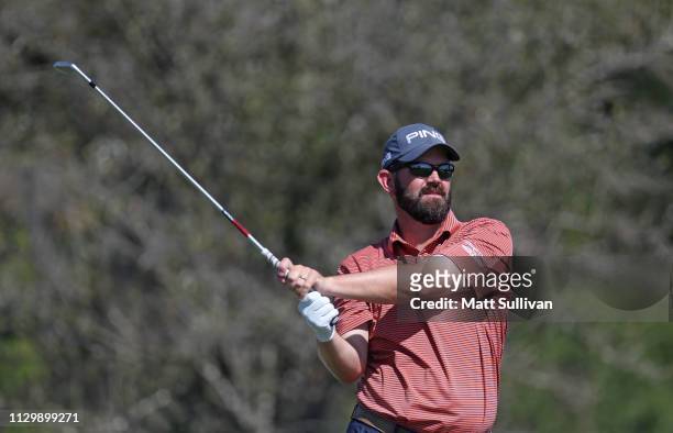 Edward Loar watches his tee shot on the 17th hole during the second round of the LECOM Suncoast Classic at Lakewood National Golf Club on February...