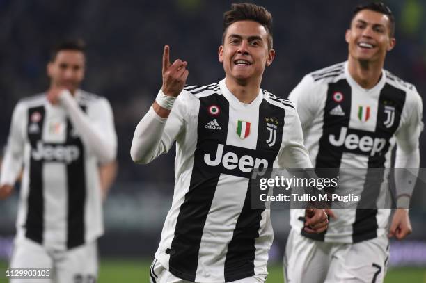 Paulo Dybala of Juventus celebrates after scoring the opening goal during the Serie A match between Juventus and Frosinone Calcio on February 15,...