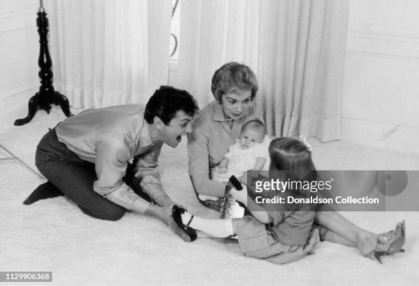 Actors Tony Curtis and Janet Leigh with their children Kelly Curtis and and younger daughter Jamie Lee Curtis in 1959.