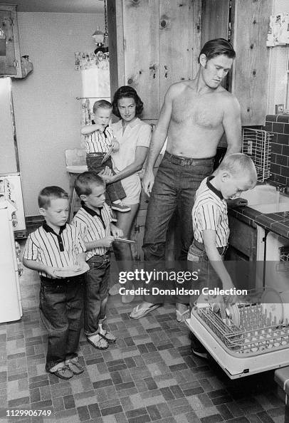 Elizabeth Riddel Actor Chuck Connors in the kitchen with his wife Elizabeth Jane ...