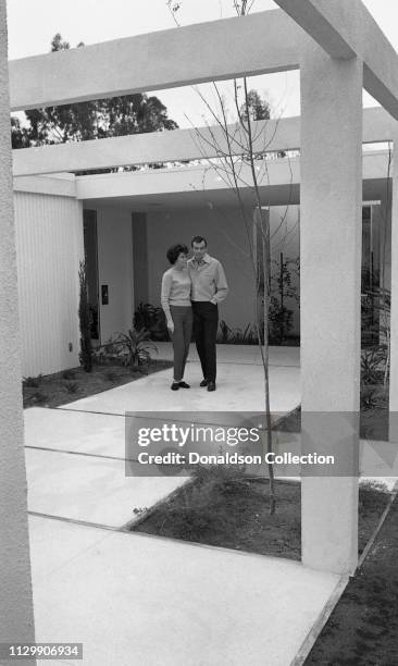 Actor David Janssen of "The Fugitive" at home with his wife Ellie Graham in circa 1963.