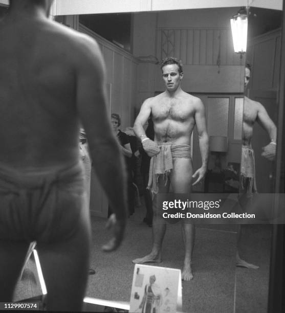 Actor Charlton Heston costume fitting for the movie "Ben Hur" in 1959.