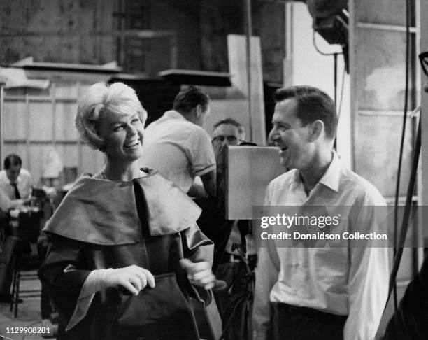 Actors Doris Day and Tony Randall on the set of a movie in 1961.