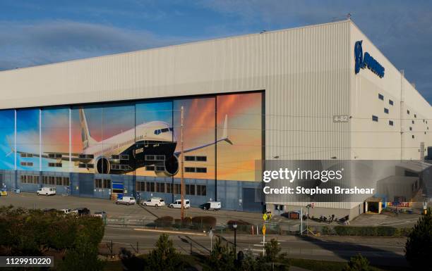 The Boeing 737 factory is pictured with a 737 on the doors, on March 11, 2019 in Renton, Washington. Boeing's stock dropped today after an Ethiopian...