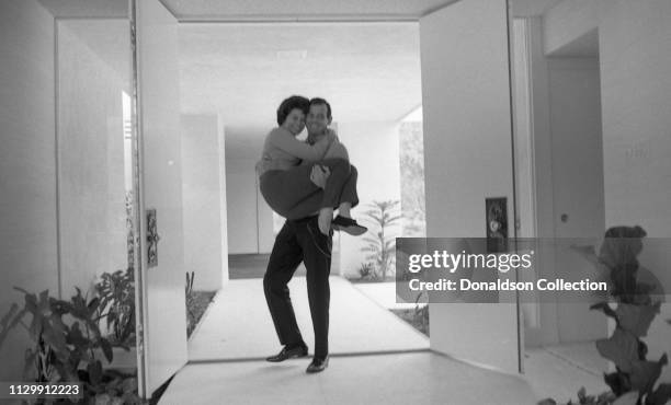 Actor David Janssen of "The Fugitive" at home with his wife Ellie Graham in circa 1963.