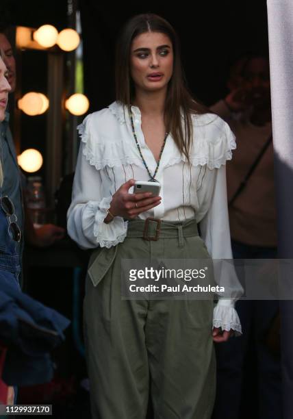 Model Taylor Hill visits the set of 'Extra' at Universal Studios Hollywood on January 24, 2019 in Universal City, California.