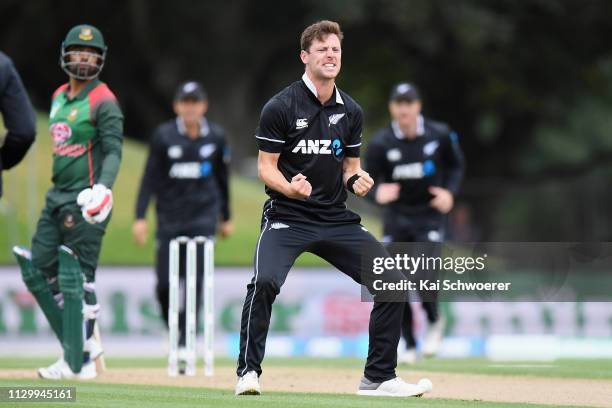 Matt Henry of New Zealand celebrates dismissing Tamim Iqbal Khan of Bangladesh during Game 2 of the One Day International series between New Zealand...