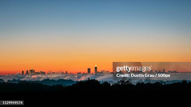 cloud city - atlanta skyline stock pictures, royalty-free photos & images