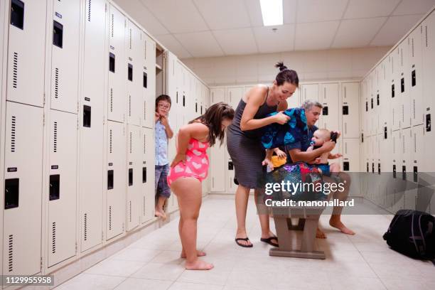 family with four childs whom two are down's syndrome and autism - step father stock pictures, royalty-free photos & images