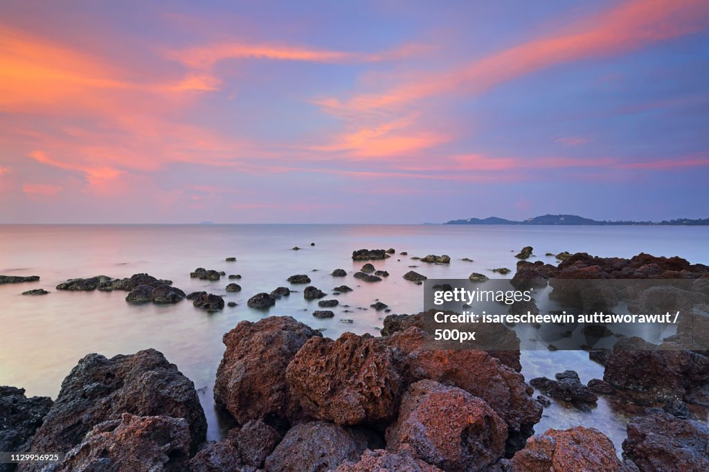 Clouds Rocky And Sea