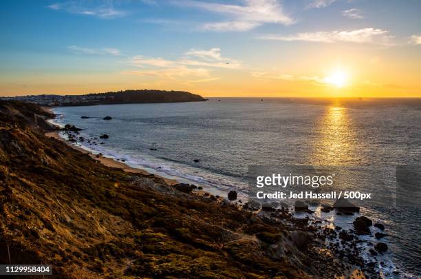 sunset over baker beach - baker beach stock pictures, royalty-free photos & images