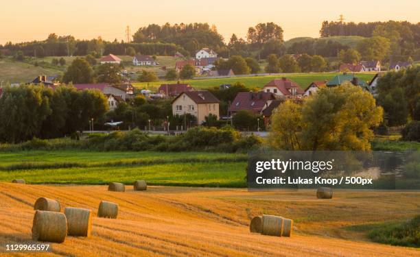 landscape with polish village - village stock pictures, royalty-free photos & images